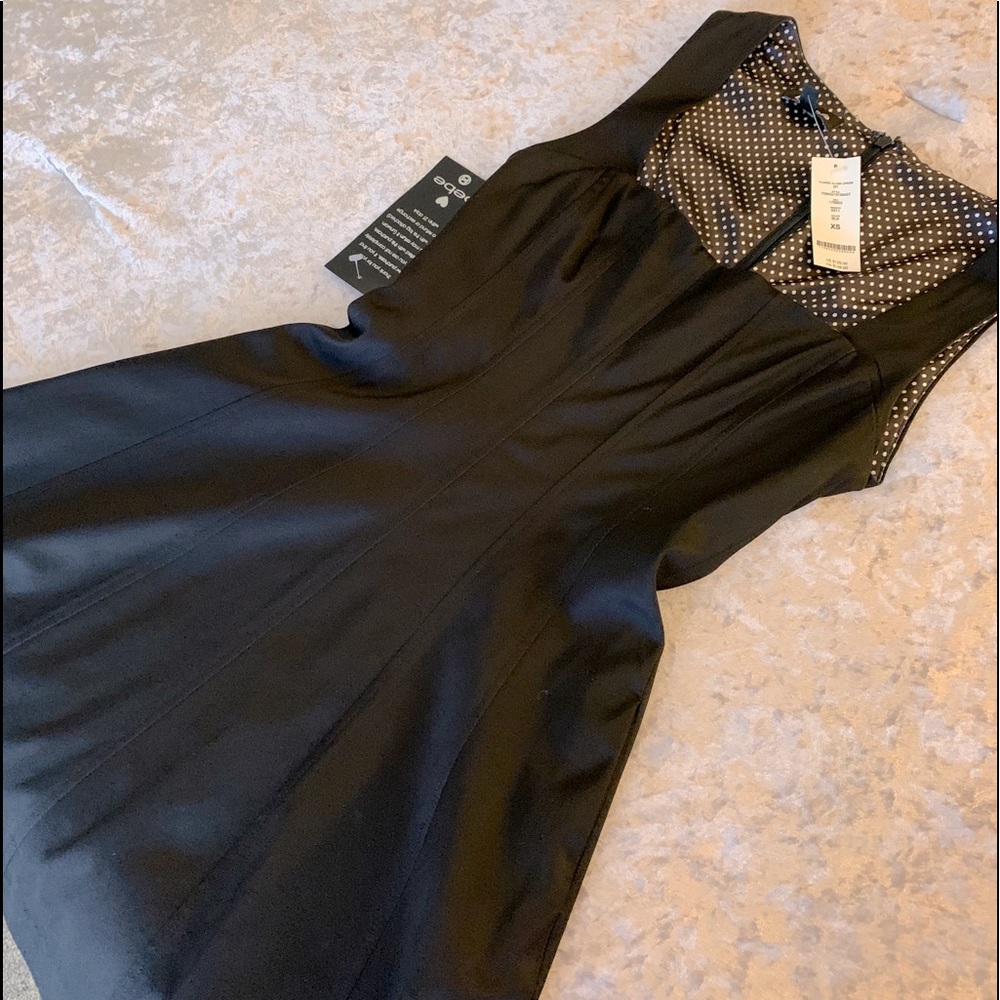 Bebe fully lined satin feel dress